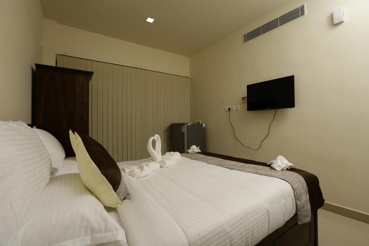Le Noor Hotel Kochi Bagian luar foto